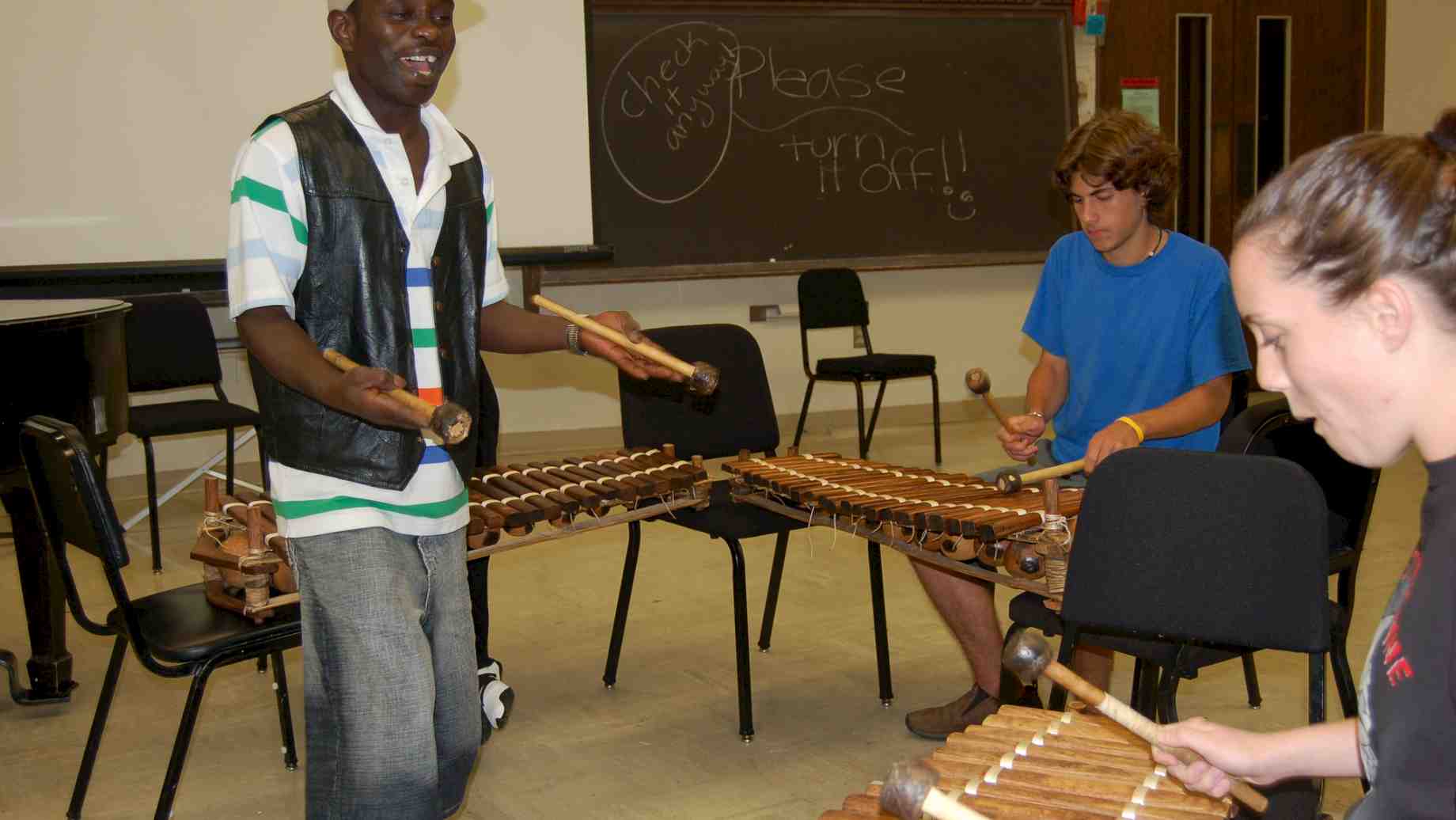 Five-time Artist-in-Residence, Abou Sylla of Guinea, teaching balafon to music students.