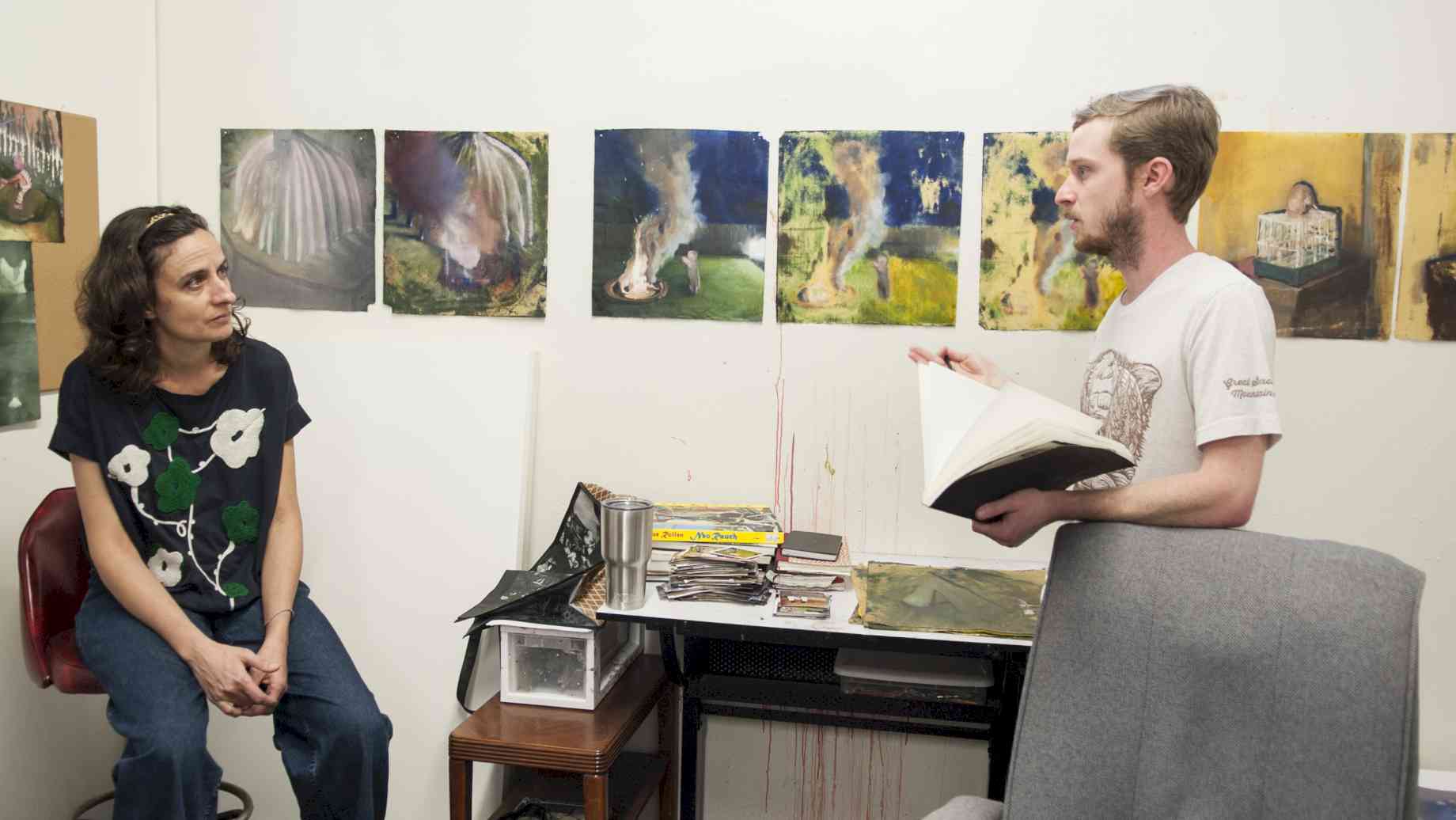 Visiting Artist Eileen Quinlan conducts a studio visit with Painting grad Franklin Ratliff