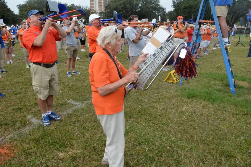 Sophy Mae Mitchell plays the bell lyre during alumni band field rehearsal in 2017.