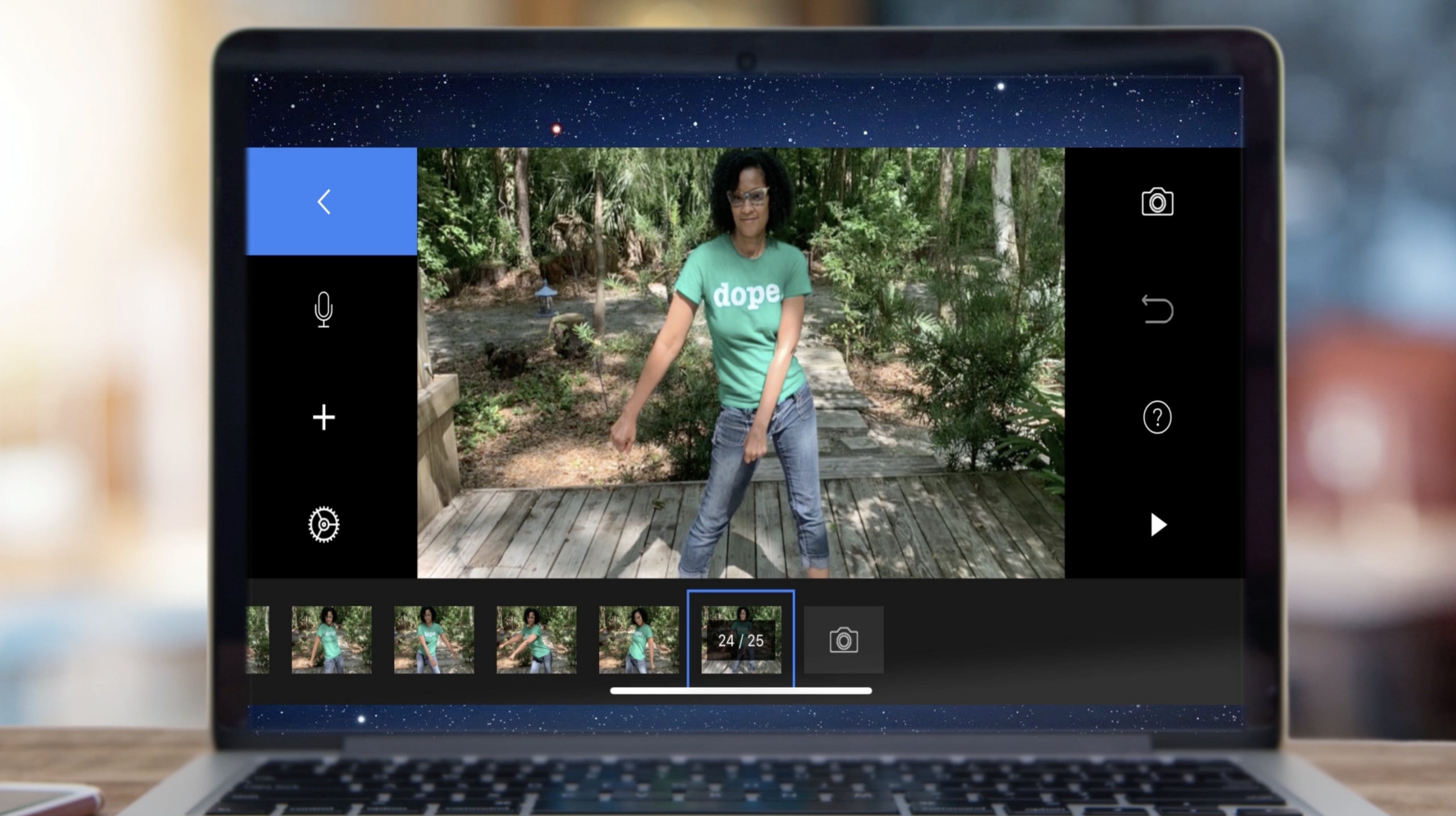 A laptop monitor displays video stills of a woman dancing