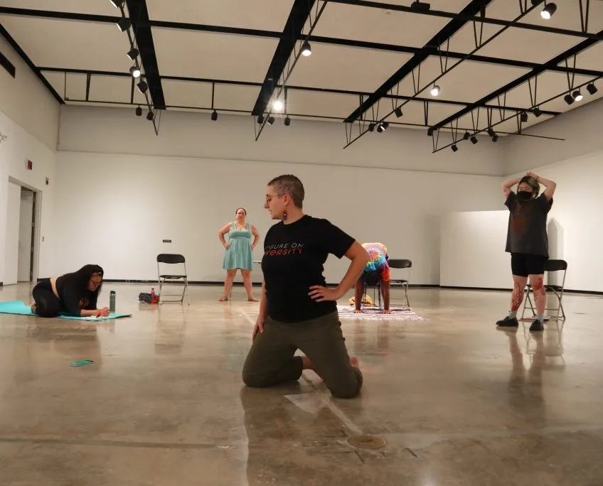 Angela DeCarlis leads a posing workshop for Figure on Diversity models.