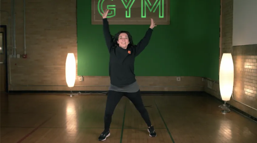 A woman stretches in a 