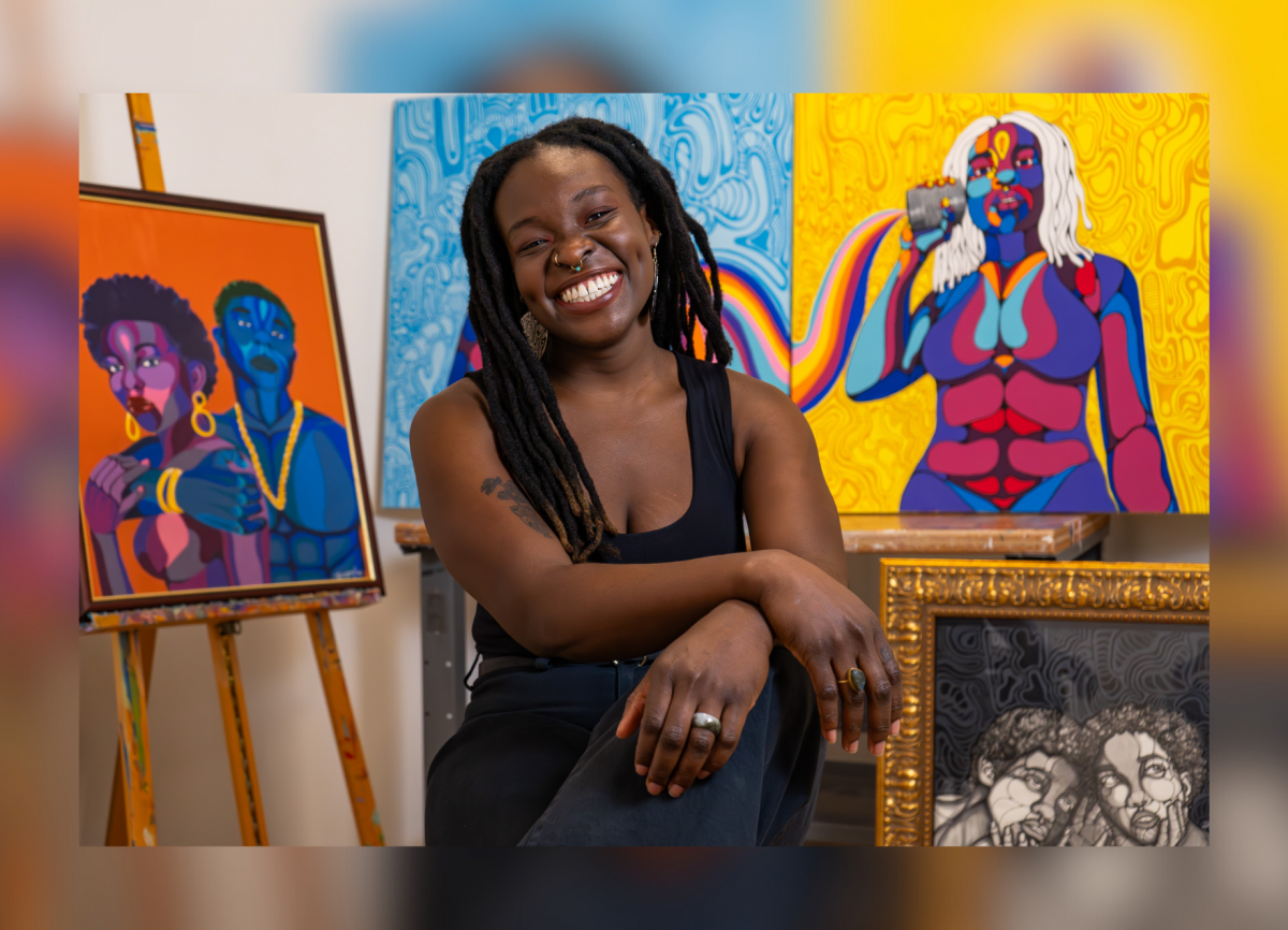 An artist flanked by two of her paintings