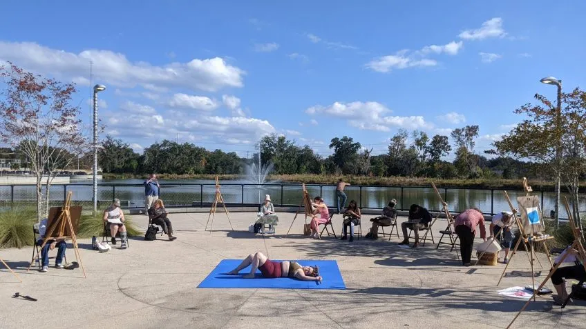 An outdoor figure drawing session at Gainesville's Depot Park