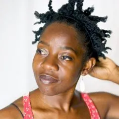 Headshot photo of Rujeko Dumbutshena