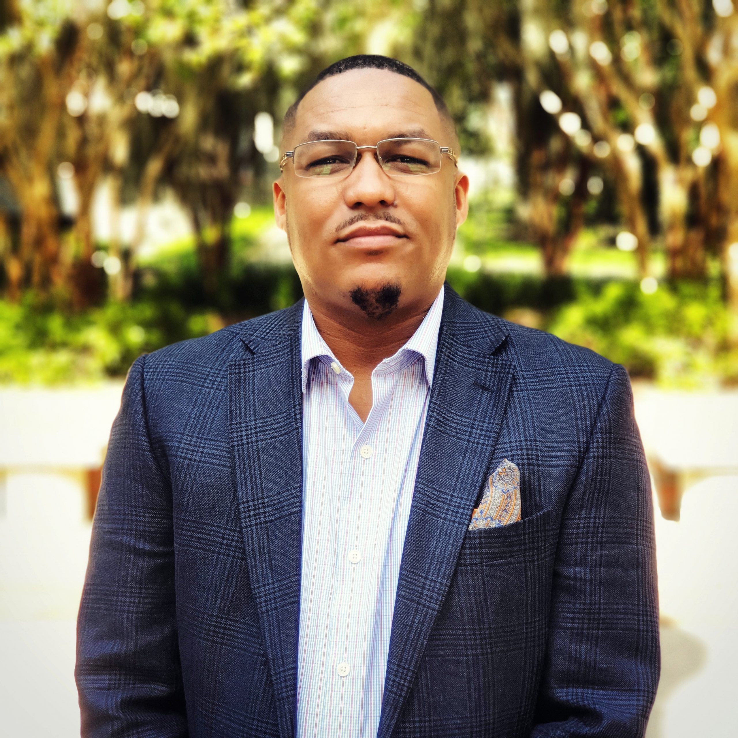 Headshot photo of Oṣubi Craig