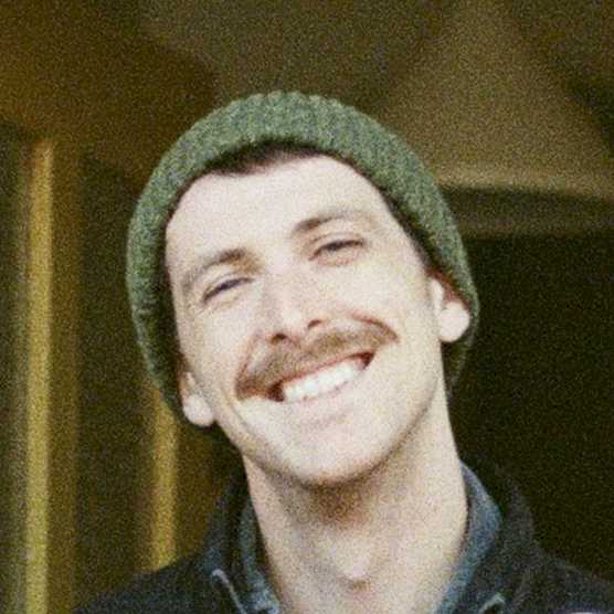 Headshot photo of David J Clulow