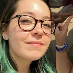 Headshot photo of Sarah E Joy