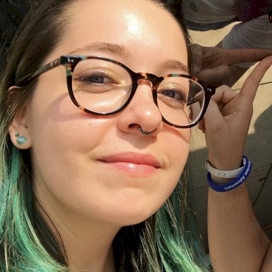 Headshot photo of Sarah E Joy