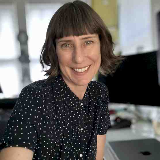 Headshot photo of Julie A Esbjorn