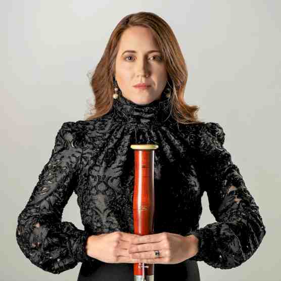 Headshot photo of Shannone Lowe with her bassoon