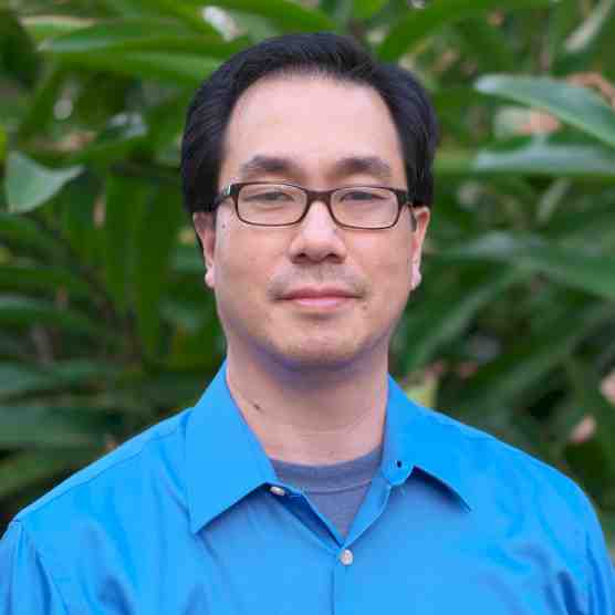 Headshot photo of Masatoshi Enomoto