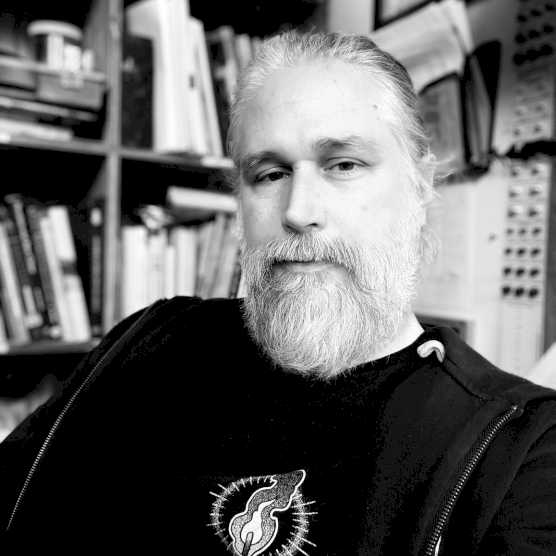 Headshot photo of Derek O. Reeverts