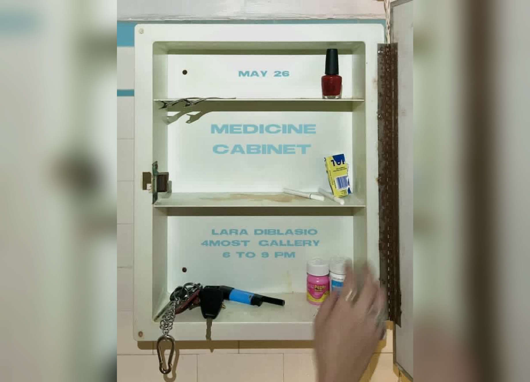 Exhibition poster for Medicine Cabinet with photo of an open medicine cabinet sparsely filled with a bottle of red nail polish, cigarettes, house keys, and pill bottles on 3 shelves. A hand reaches into the cabinet.