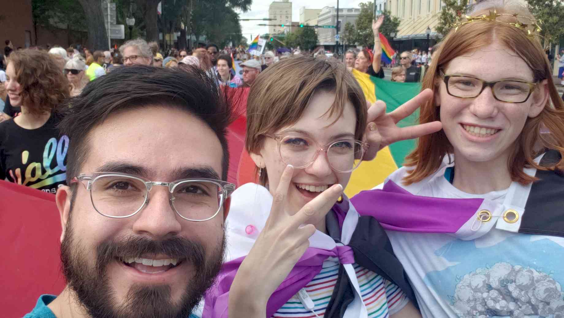 Marching in the 2019 Gainesville Pride Parade with our Theatre Connect participants!