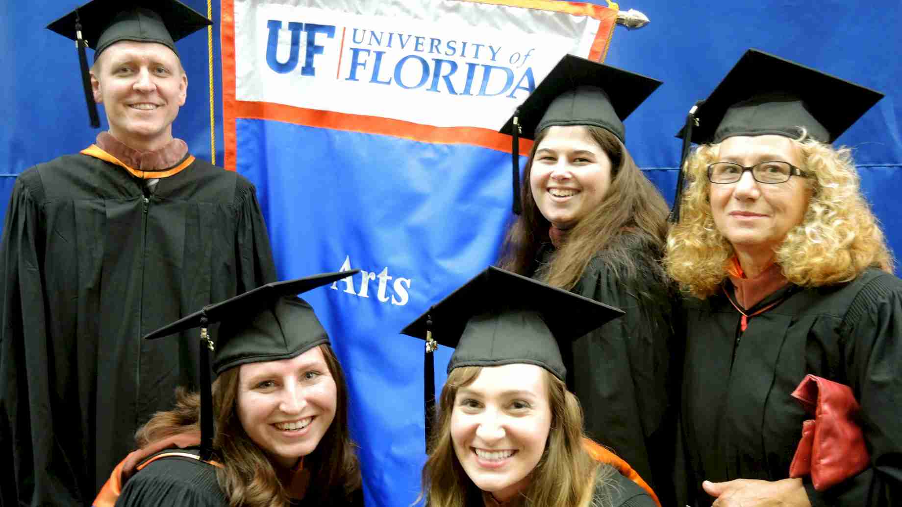 Some of our graduates from the Online MA program in art education participating in commencement activities on campus.