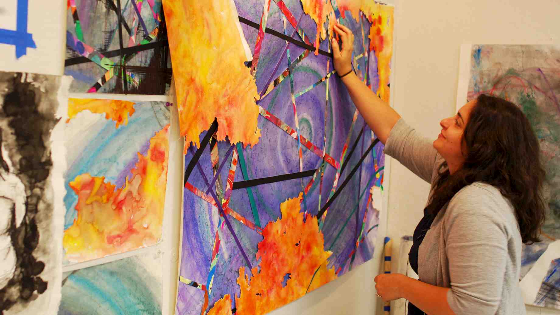 Georgia art teacher Sasha Newman working on a mixed media piece in Experimental Drawing, Summer 2014.