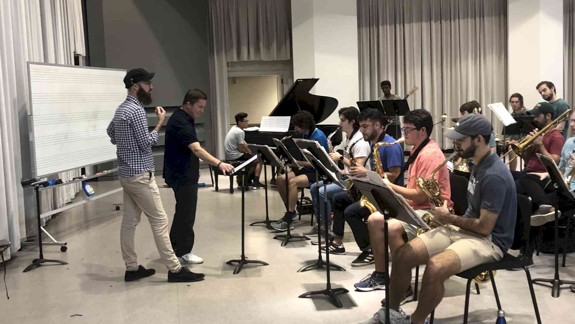 Graduate student composer Daniel Townsend leads the UF Jazz Band in a reading of his composition