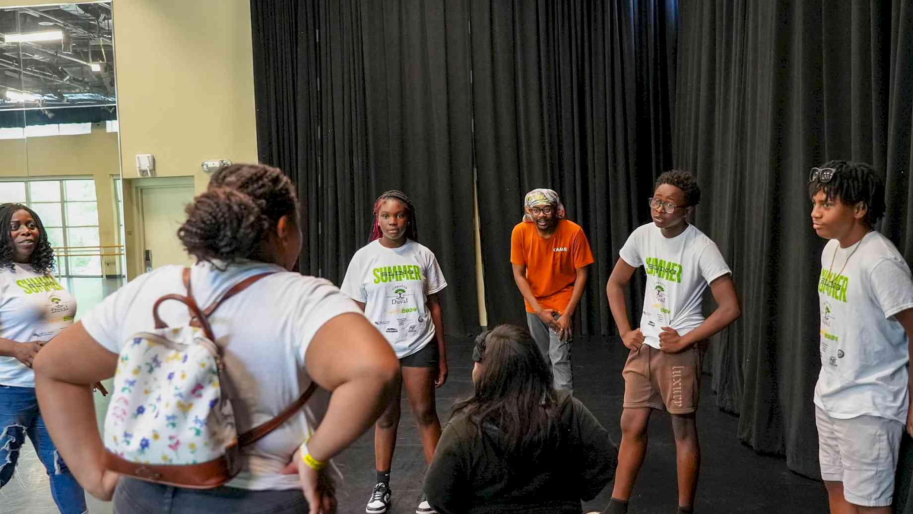 Braxton Rae facilitates a theatre workshop with the Greater Duval youth summer program. Photo by Ravyn Gale.